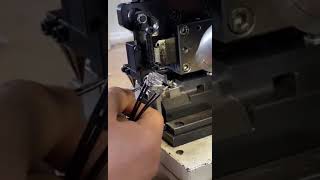 HH-MO Terminal Crimping Applicator is processing linked flag terminals on 2-pin cable