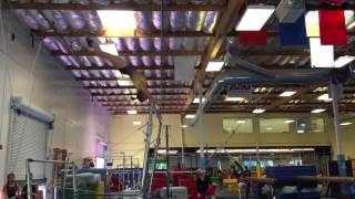 Valerie's double front dismount off bars