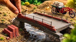 Building mini concrete bridge using by mini bricks and metal rod |