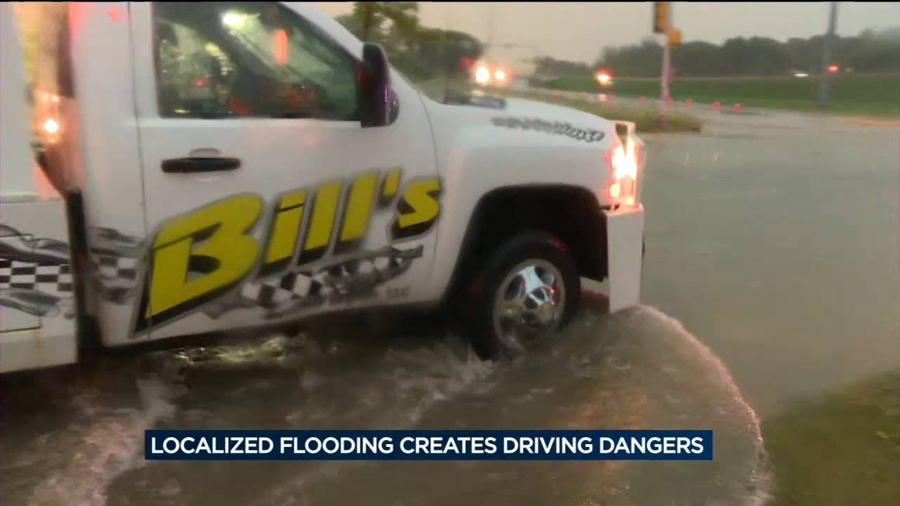 Storms, heavy rain flood roads, knock out power to thousands - YouTube