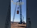 The large compaction hammer firmly strikes the compacted ground