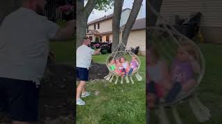 Guy spins kids on tree swing and it breaks causing them to falls on the ground