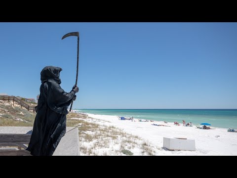 Lawyer dressed as Grim Reaper haunting Florida beaches 