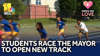 Mayor runs with Pimlico students to open new track