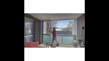 Stylewise Zipslide retractable insect screen. Screened balcony to make an insect free outdoor room.