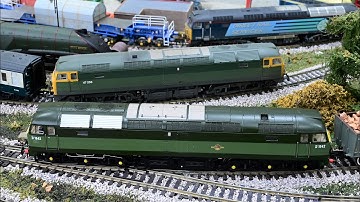 Bachmann class 47 locomotives on my model railway pulling rolling stock.