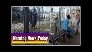 'critical situation' as police storm manus island camp to remove refugees