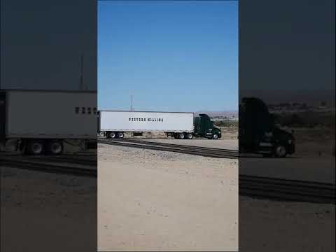 BIG RIG WITH WESTERN MILLING TRAILER