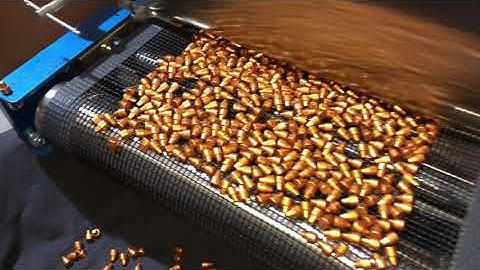 Projectiles coated with Hi-Tek Supercoat  exiting our conveyor oven