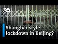 COVID cases in Beijing prompt new restrictions | DW News