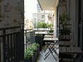 Sunlit Balcony Harmony: A Color-Coordinated Mini Greenhouse Makeover