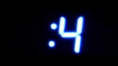 [Slow motion] Seven-segment LED clock at 1400 FPS