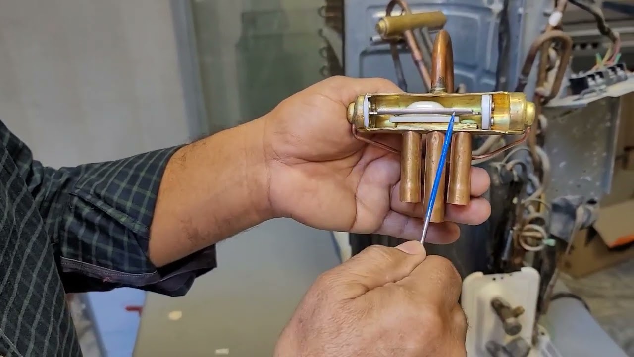 لماذا يتوقف العاكس دورة في تبريد او تدفئة الاسباب و طريقة تغير صمام عاكس