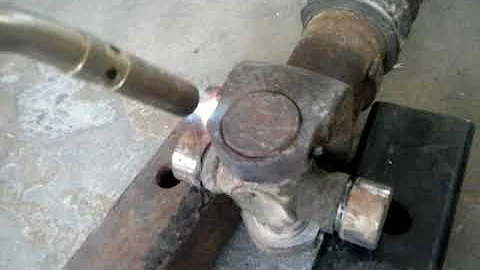 Effortlessly Remove Universal Joints with Heat and Hammer Method