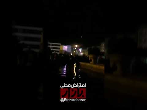 Tehran, night fall, people chant and curse the repressive forces