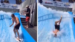 Guy Fails to Surf on Surf Simulator