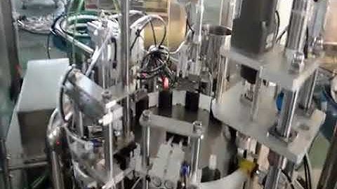 Automatic rotary filling plug roller ball inserting capping machine for essential balm medicated oil