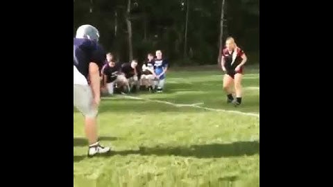 Woman Rugby Player vs Male Football Player