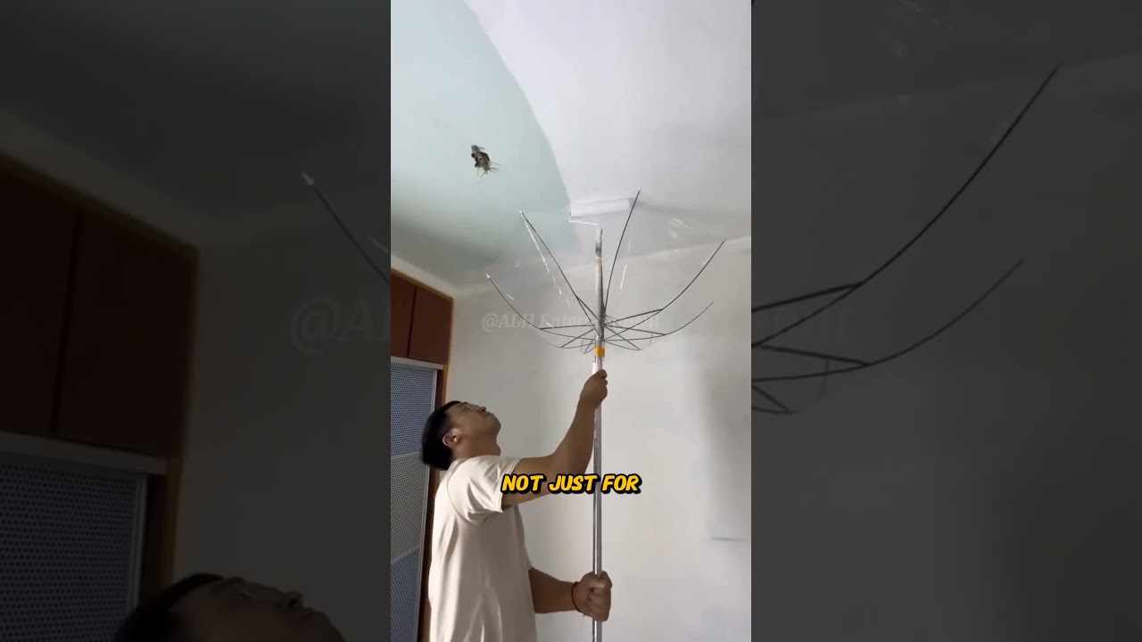 Using a modified long roller to paint the ceiling 