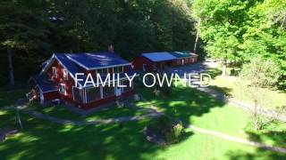 Wellneste Lodge in Taberg NY Drone View of Cabin Rentals, Fish Creek River and Retreat Center