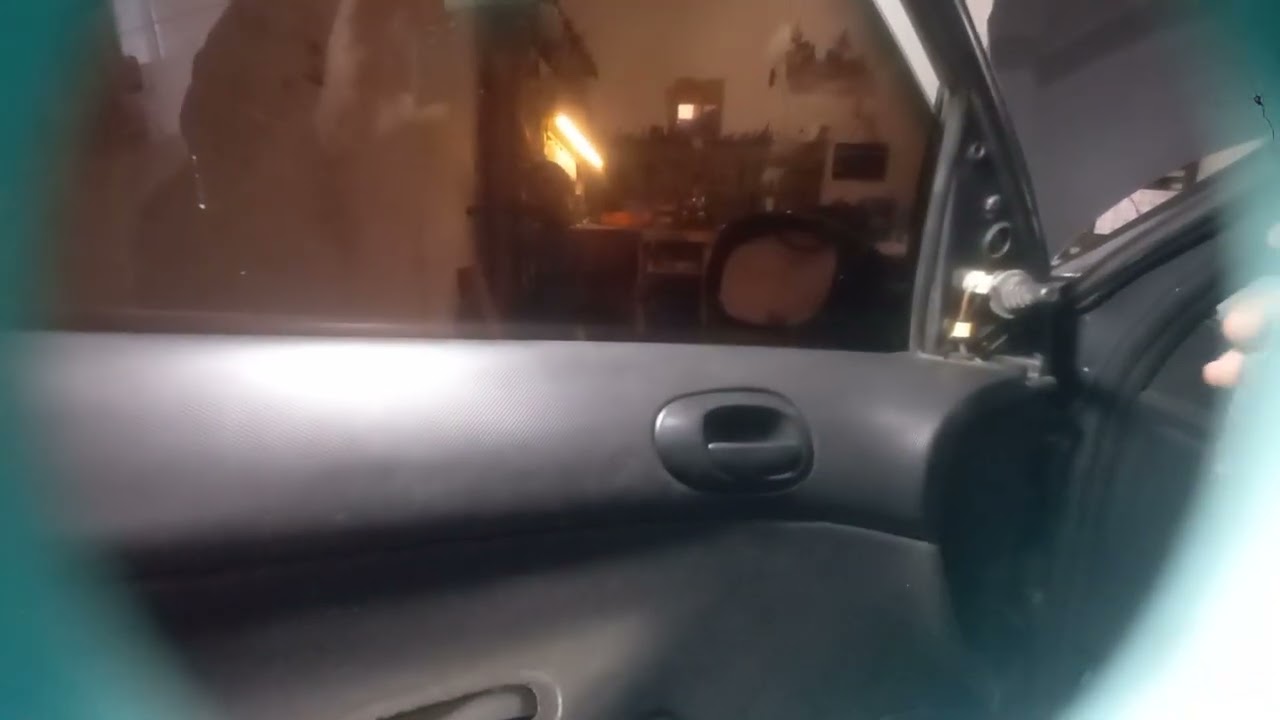 Como desmontar forro da porta Peugeot 207