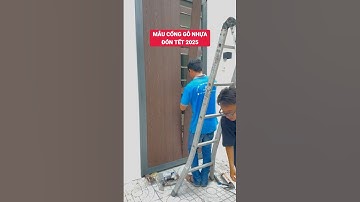 Mẫu cổng gỗ nhựa đón Tết 2025 sang - hiện đại