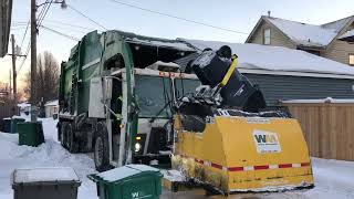Waste Management Garbage Truck on Late Collection in Freezing Snowy Alleys