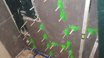 Tile Shower Failure and repair. Part 4 installing large format  tile with MLT leveling system