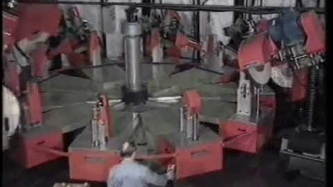 Fully programmable rotary table buffing machine.