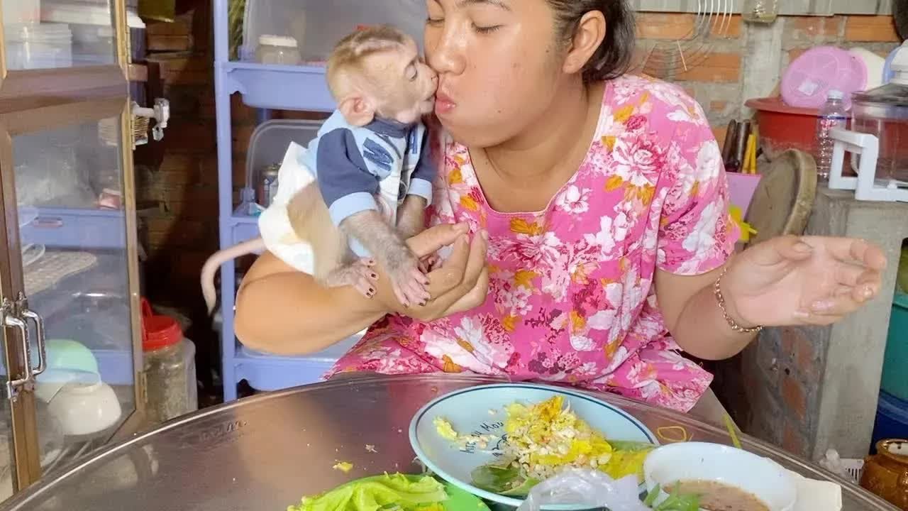 Baby DAM Very Enjoy Eating Food Snack With Mommy