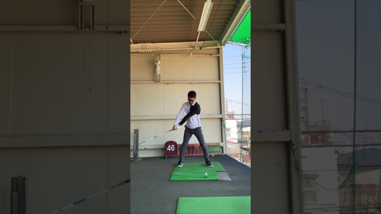 バックスイング深く回転