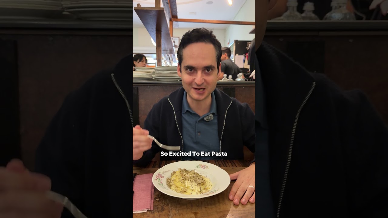 Trying the famous flaming Parmesan-wheel tagliatelle in Italy!