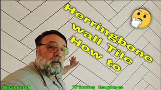 How to tile a herringbone wall.
