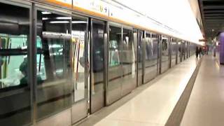 Hong Kong, Mtr Train Departing From Tung Chung Station Enhanced Video Version