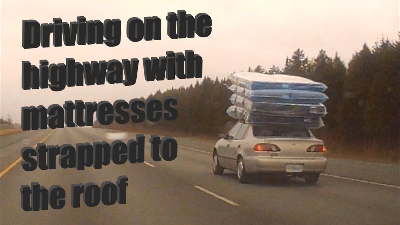 4 mattresses on the roof of a car driving on the highway YouTube