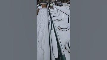 Removing Snow From Steel Walkway Railing