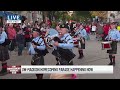 Madison Pipes and Drums walks in UW-Madison homecoming parade