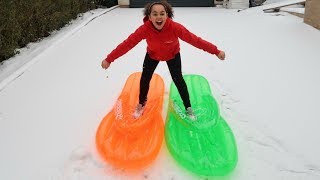 best snow day ever sledding on inflatable floaties toys andme