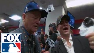 Chicago cubs superfan bill murray gets a little champagne sprayed in
his eyes while interviewing dexter fowler, theo epstein and jason
heyward following thei...