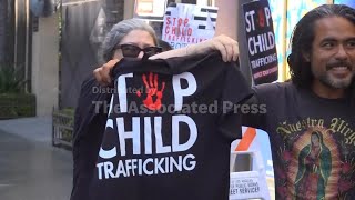 Protesters gather just blocks from the Oscars