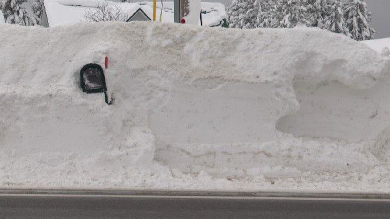 Buried in Barnes Corners: there’s a mailbox in there somewhere