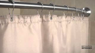 Moen Adjustable Curved Shower Rod at Bed Bath & Beyond