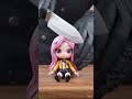 Hand slicing vinyl doll