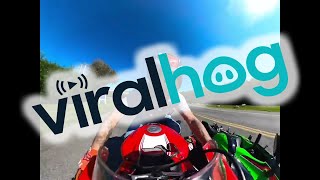 Motorcyclist Hangs On When Hit || ViralHog