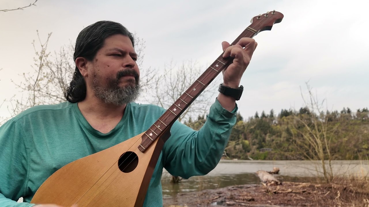 Wendell, the round bottom, longneck dulcimer by the riverside