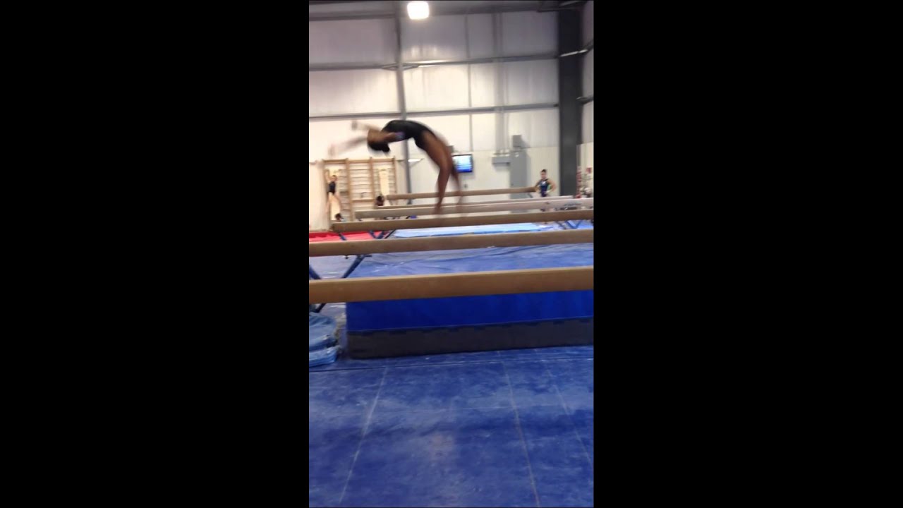 NaTori Robinson- 2 Back-Handsprings Layout Stepout
