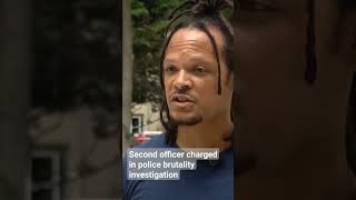 Second officer charged in police brutality investigation