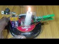 Candle alarm using a battery and a peg