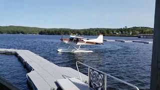 Seaplane Taxies Up to the Dock