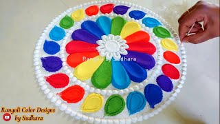 easy rangoli design using spoon I simple kolam design I chukkala muggulu I rangoli color designs screenshot 5